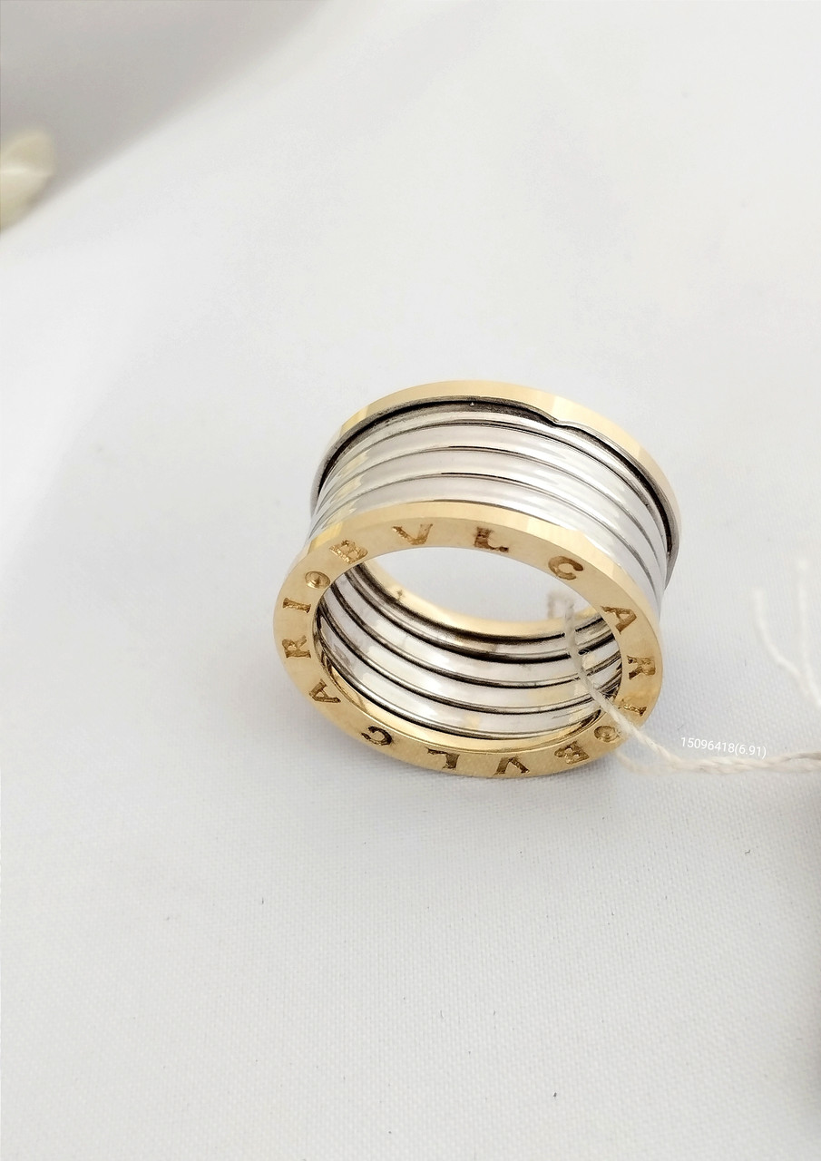 Золоте кільце з білого і жовтого золота 585 проби