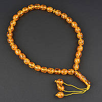 Чітки пластикові з жовтогарячими напівпрозорими намистинами та висувкою кількість намистин 33 штуки довжина 35 см