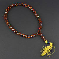 Чітки пластикові з коричневими намистинами та жовтим хвостиком кількість намистин 33 штуки довжина 35 см