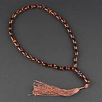 Чітки пластикові з коричневими намистинами та коричневим хвостиком кількість намистин 33 штуки довжина 35 см