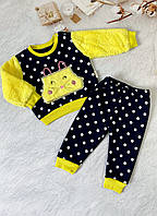 Желто-черный теплый костюм для новорожденной девочки