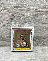 Ікона Спаситель в білому дерев’яному кіоті під склом