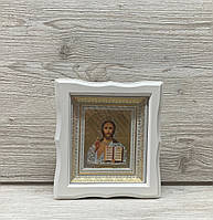 Ікона Спаситель в білому дерев’яному кіоті під склом
