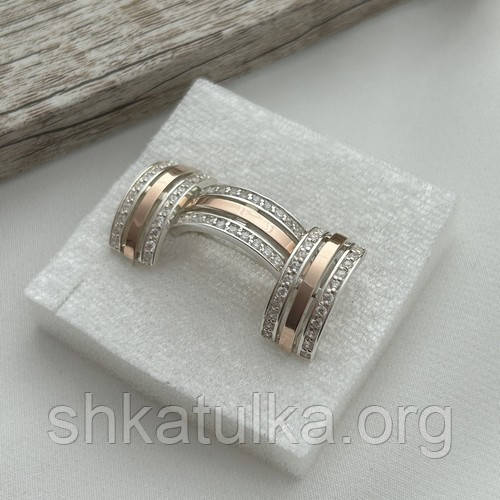 Комплект зі срібла з золотими напайками та фіанітами каблучка та сережки