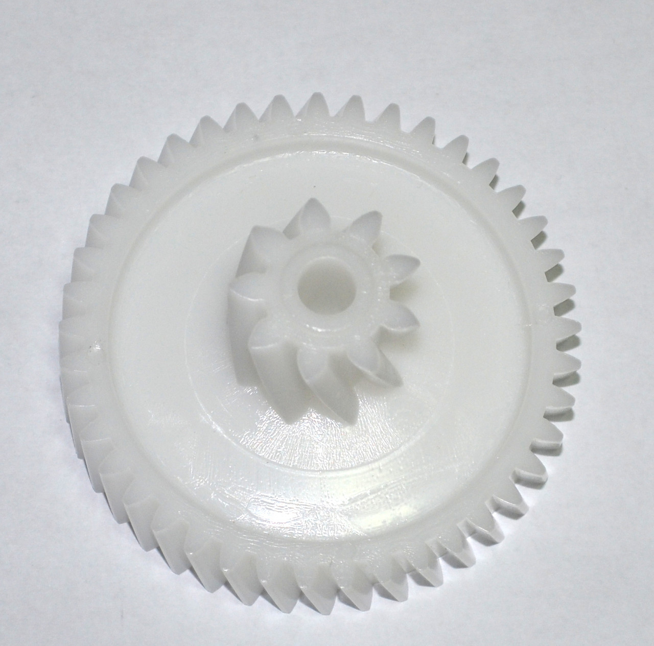 Шестерня для м'ясорубки середня Zelmer 187.0004 66/23 41/9 косих зубів.Оригінал.