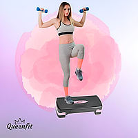 Степ-платформа QueenFit черно-розовая для аэробики и фитнеса с 2-ступенчатой регулировкой высоты.