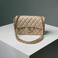 Бежевая женская сумка Chanel 1.55