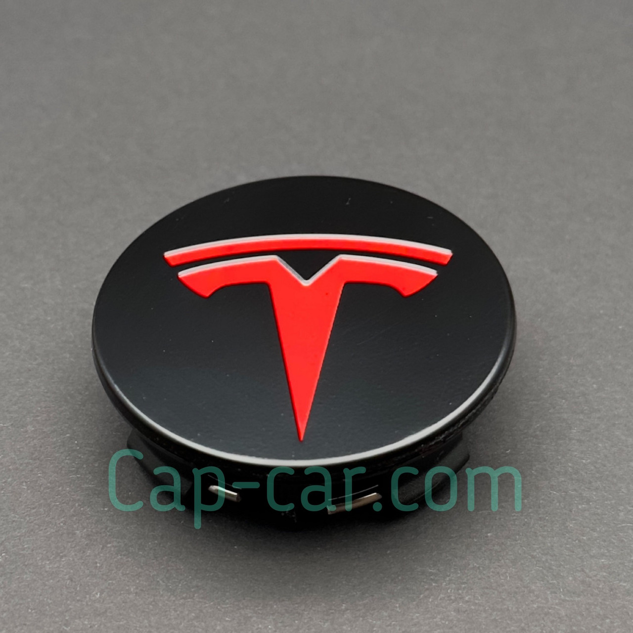 Ковпачок, заглушка для колісного диска Тесла Tesla чорний з червоним логотипом. 57 мм.