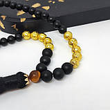 Чотки із матового оніксу і вулканічної лави золоченої на 50 намистин, фото 9