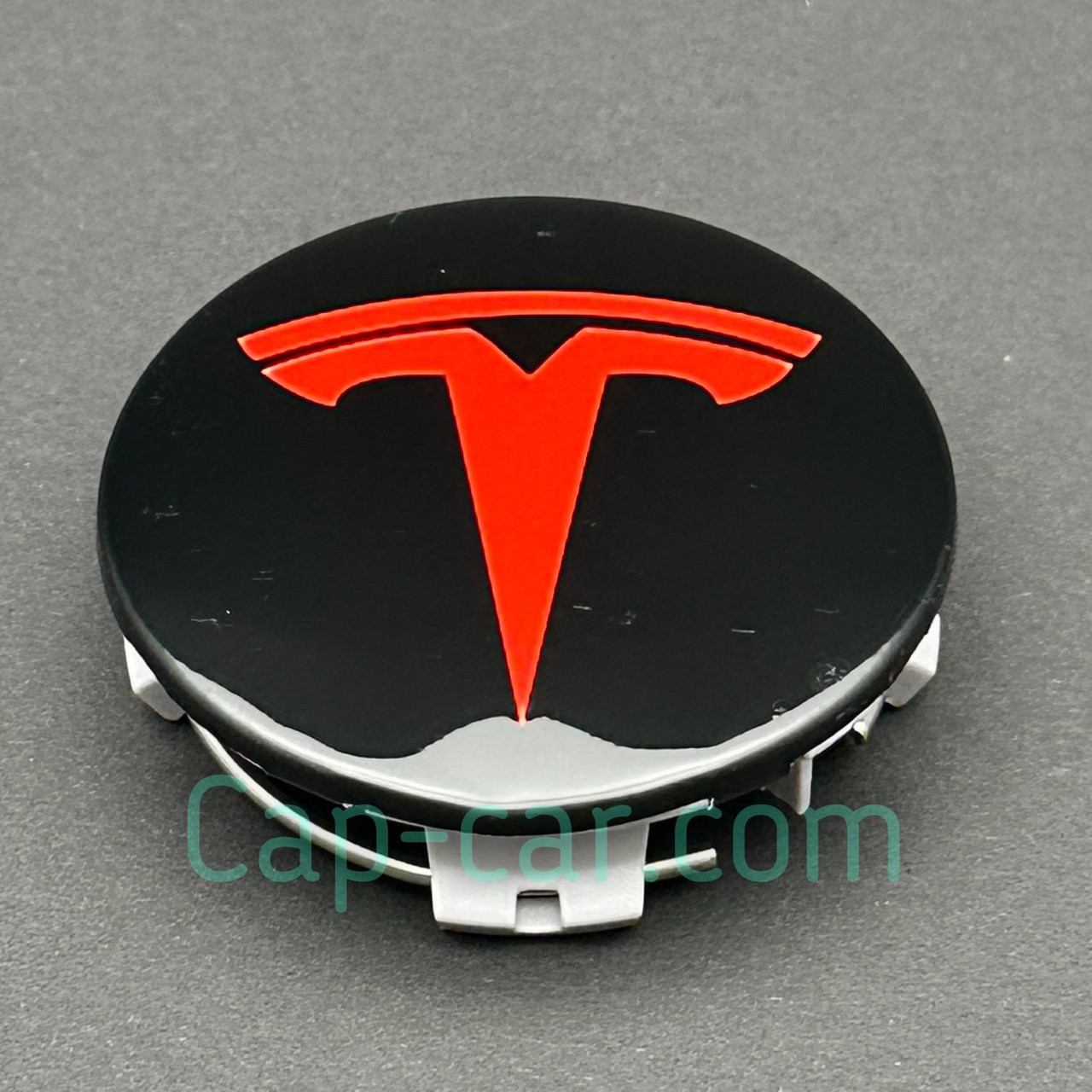 Ковпачок, заглушка для колісного диска Тесла Tesla чорний з червоним логотипом. 57 мм.