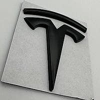 Емблема Тесла на капот 60 мм 56 мм Tesla черная