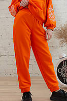 Штаны джоггеры для девочки оранжевого цвета из материала трехнитка качества пенье р. 104-170