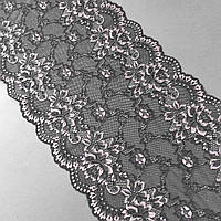 Стрейчеве (еластичне) мереживо чорного з рожевим кольору, ширина 23 см.