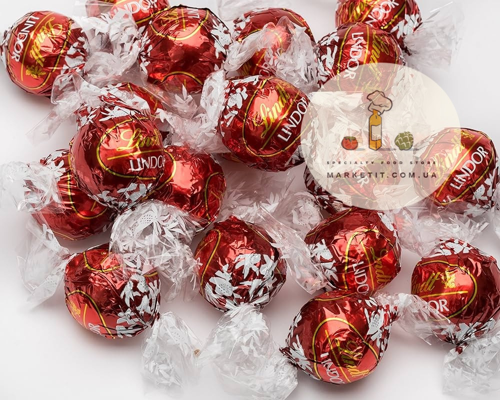 Шоколадные конфеты Lindt Lindor Milch, молочный шоколад с пралине, весовые - фото 1 - id-p1962670485