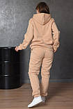 Спортивний костюм жіночий на флісі бежевого кольору 165240L, фото 3