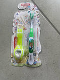 Гарна дитяча зубна щітка м'яка з іграшкою наручним годинником, для дітей від 3 років, фото 2