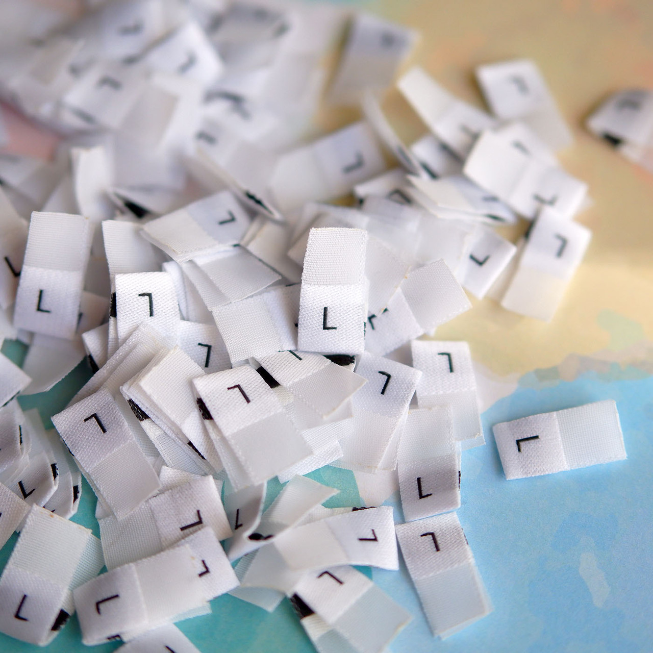 Розмірники жакардові білі, 1000шт L