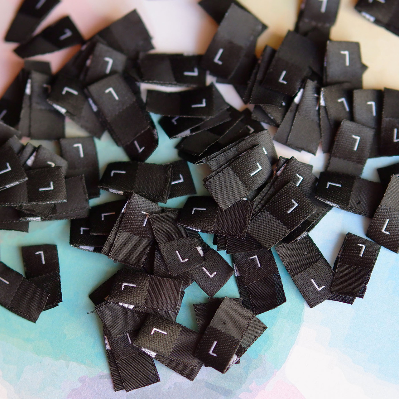 Розмірники жакардові чорні, 1000шт L