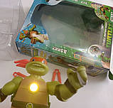Ігрова фігурка 0810B15 Герої Черепашки ніндзь TMNT 1 герой Мікеланджело 15 см, вбудований проєктор, фото 5