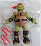 Ігрова фігурка 0810B15 Герої Черепашки ніндзь TMNT 1 герой Мікеланджело 15 см, вбудований проєктор, фото 3