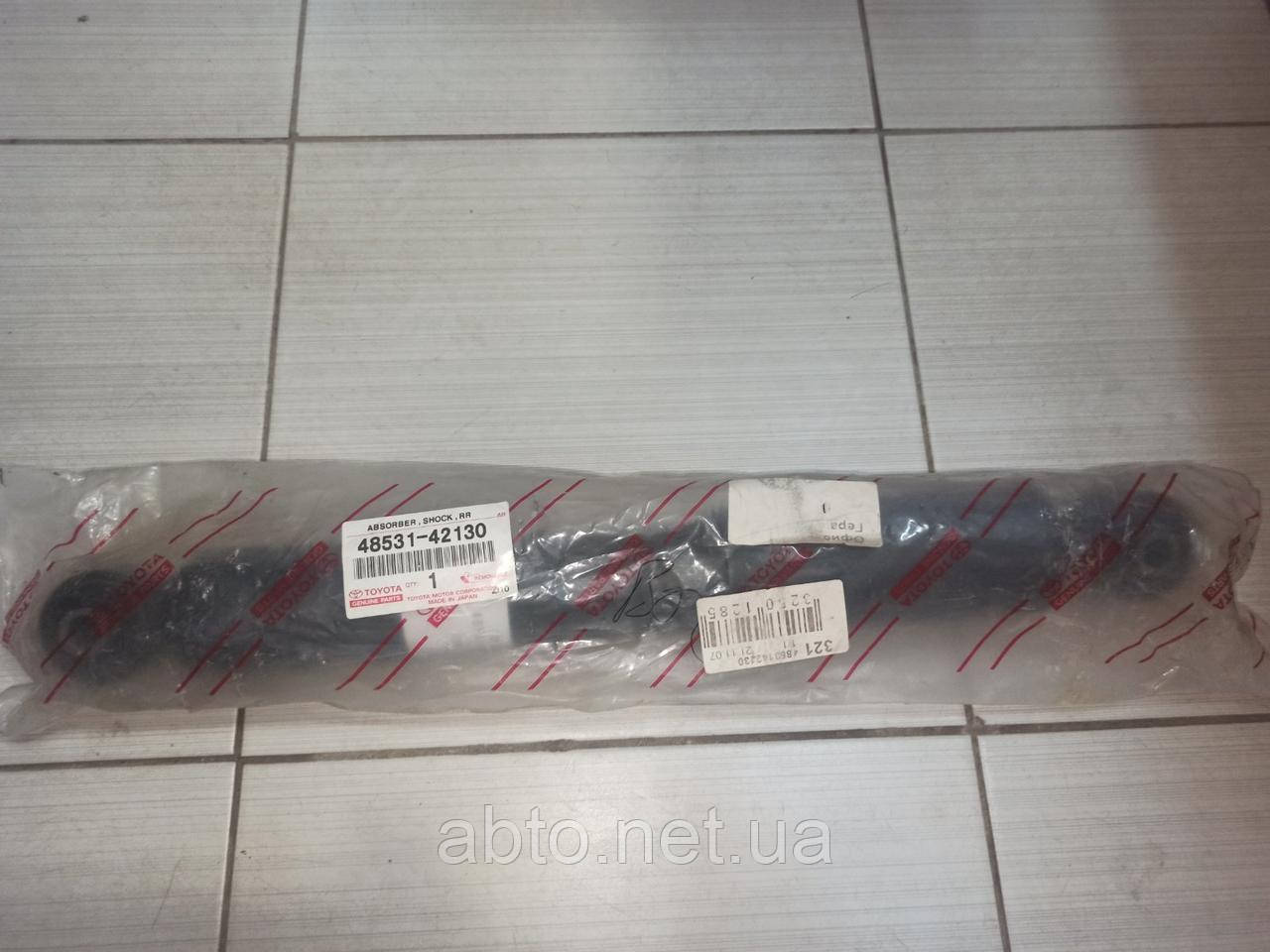 Амортизатор задньой підвіски автомобіля Toyota RAV IV 06-