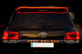 Toyota LC200 спойлер (дизайн 2018) у білому кольорі Full-LED AUC Спойлера Тойота Ленд Крузер 200