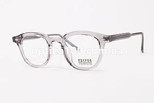Кругла сіра напівпрозора оправа для окулярів для зору. Хороший матеріал з ацетату целюлози