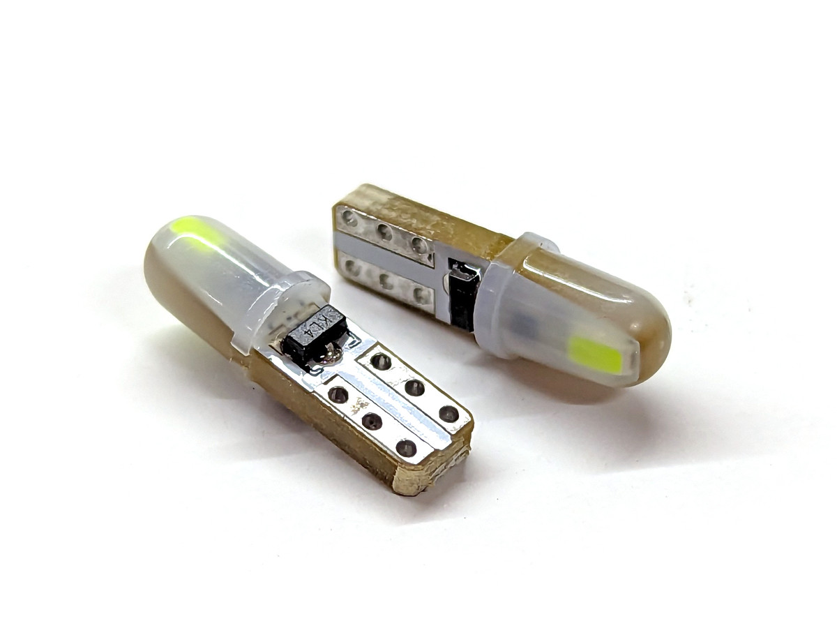 Світлодіод T5 W2x4,6d 2 SMD 3014 12V GREEN в пластиковій колбі, неполярний, друкована плата