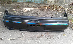 Бампер задній Nexia N-100 номер USA в зборі (GM)