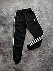 Чоловічі зимові спортивні штани Adidas чорні з лампасами на флісі Адідас, фото 5