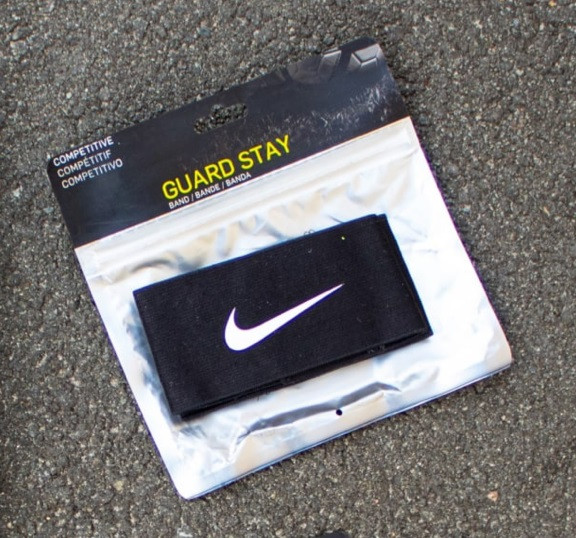 Тримачі для щитків чорні Nike