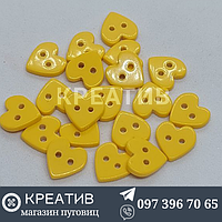 Пуговица детская 20р 13мм желтые сердечки на 2 прокола 100шт (5$)
