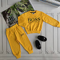Детский желтый прогулочный костюм Босс 80