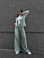 Жіночий костюм-двійка ментолового відтінку: жилет і штани прямого крою з костюмної тканини