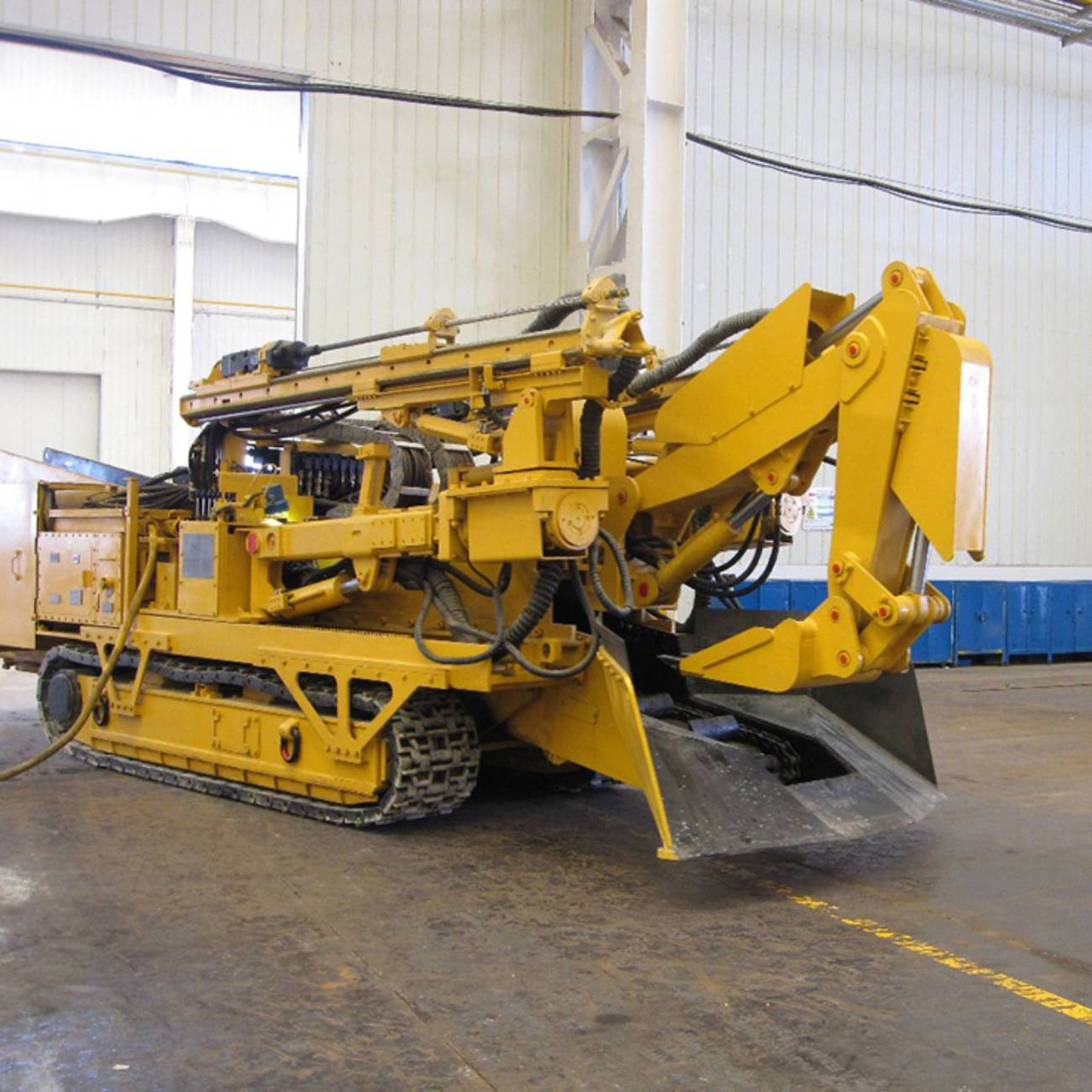 Важкий екскаватор-навантажувач із шнековим бурінням North Heavy Gryps, фото 1