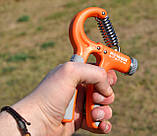 Еспандер кистьовий Power System PS-4021 з регульованим навантаженням 10-40 кг.  Power Hand Grip Orange, фото 8