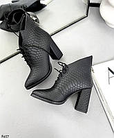 Черные ботинки на каблуке из натуральонй кожи