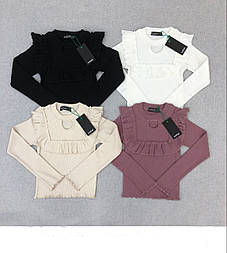 Чорна кофточка в рубчик із воланами на дівчинку