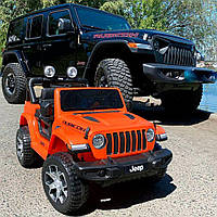 Детский электромобиль Джип Jeep Wrangler, колеса EVA, кожаное сиденье, оранжевый