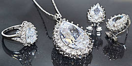 Набір: кулон на ланцюжку, сережки та каблучка 16р 18р. Родій. Камені: білий циркон.