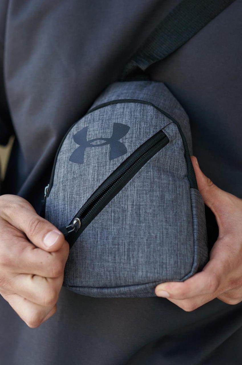 Сумка слінг under armour чоловіча через плече темно-сіра меланж сумка невелика андер армор барсетка