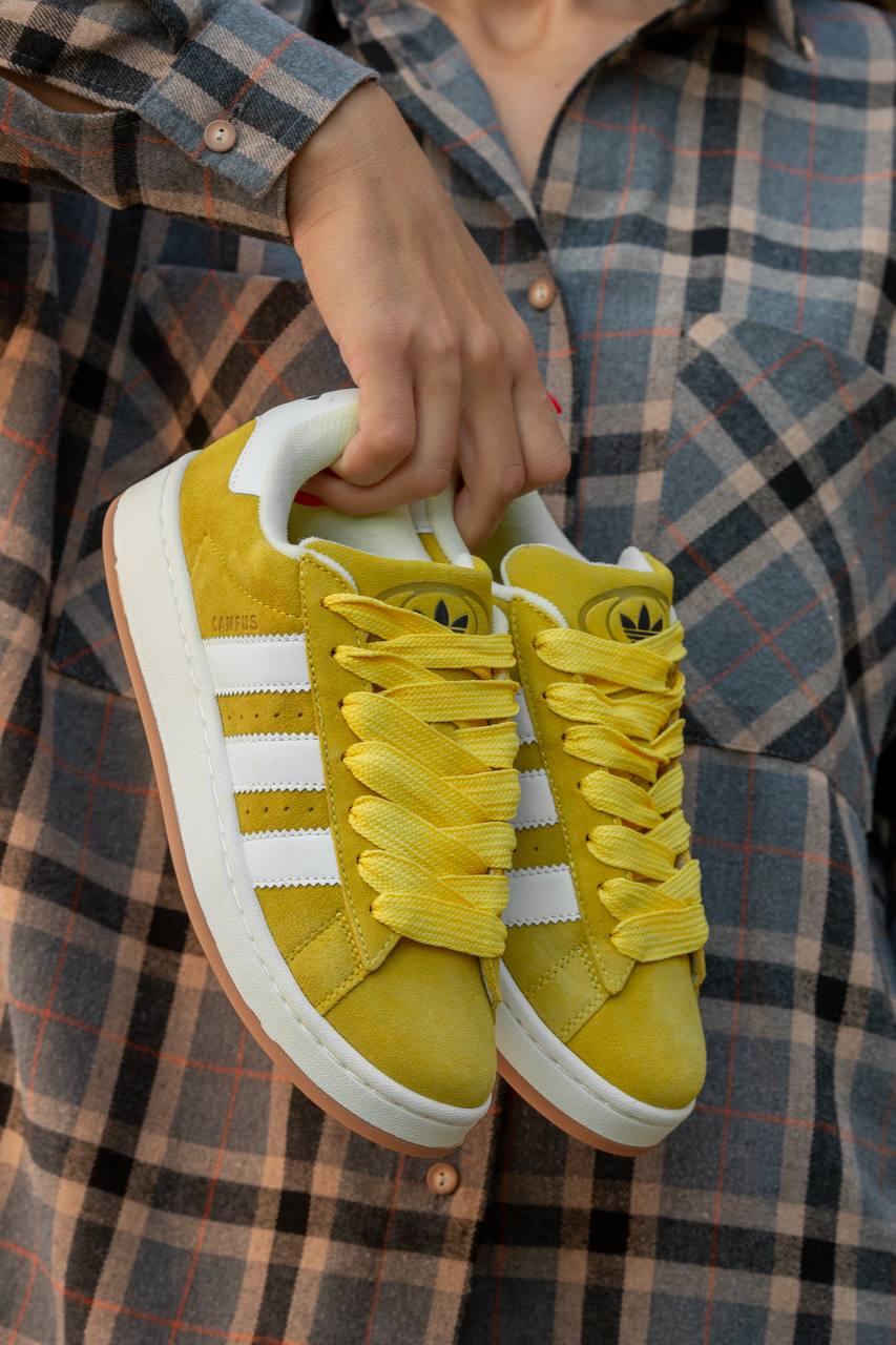 Yellow adidas sales campus shoes
