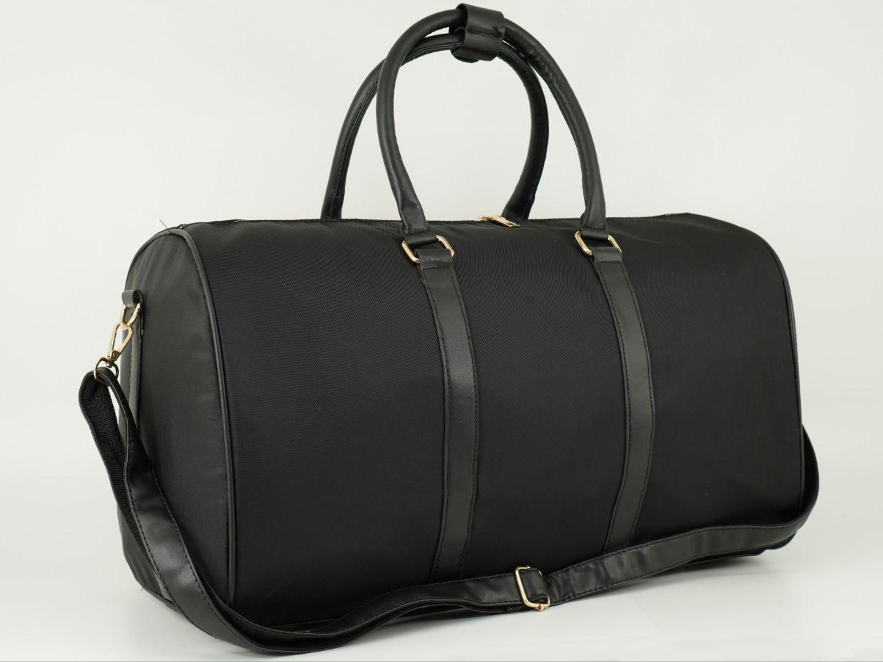 Текстильна містка дорожня сумка-саквояж 55 см чорна