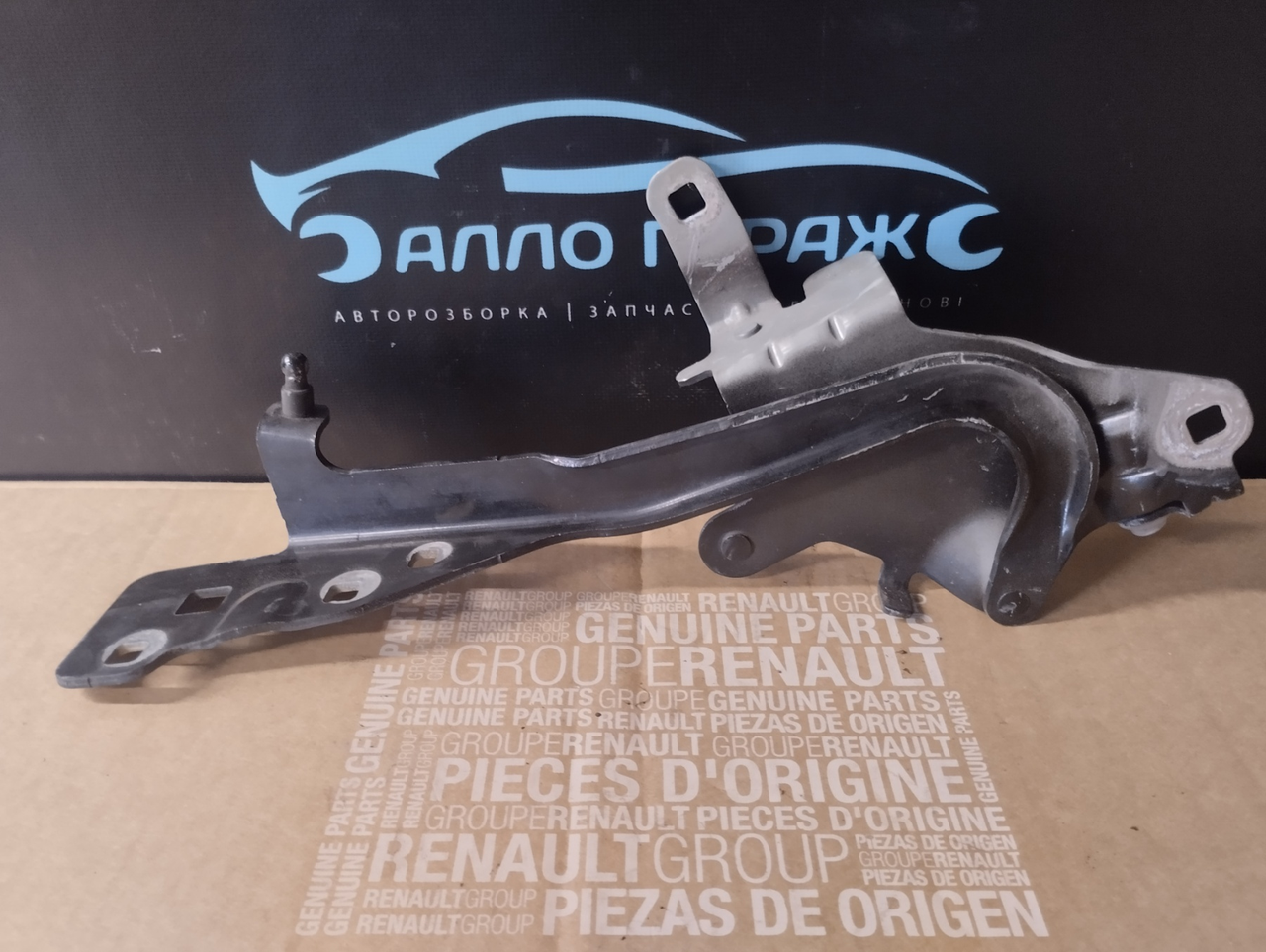Петля капота ліва Renault Scenic 3 (2009-2014) 654010004R Б.У Рено сценік 3