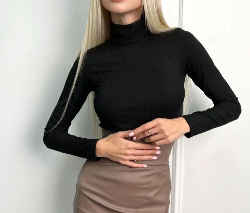 Жіночий гольф в рубчик