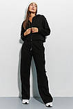Жіночий трикотажний спортивний костюм кофта на блискавці та штани кльош, фото 2