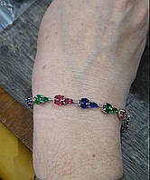 Браслет "Серпантин з кольоровими цирконами у білому медзолоті" - оригінальний подарунок дівчині