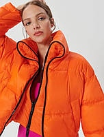 Женская оранжевая куртка Sinsay.