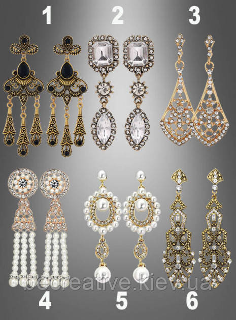 Золоті сережки з перлами і дорогоцінним камінням