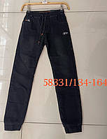 Подростковые тёплые черные джинсы на манжетах для мальчиков оптом SEAGULL 134--164см
